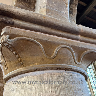 Close up shot of one of the Norman capitals at the top of a round pillar. The workmanship reveals a wonderful understanding of fluid forms.