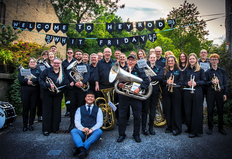 The band at Heyrod on Whit Friday with musical director Joey Wong