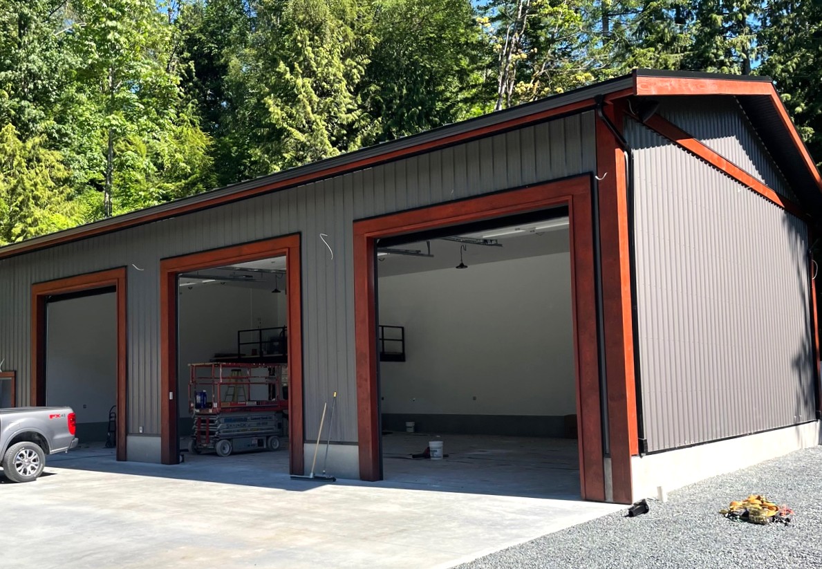 Custom shop building with metal siding built by West Royal Contracting