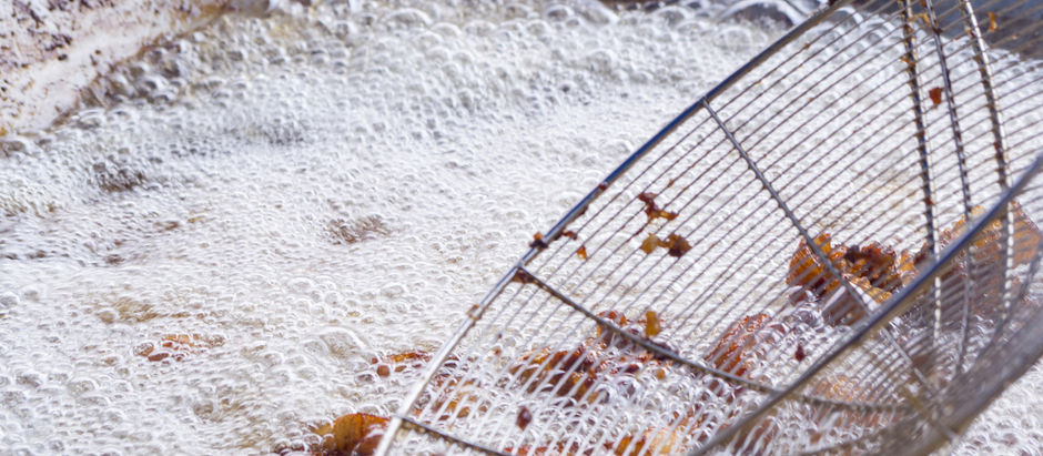 Boiling oil in frying pan for cooking