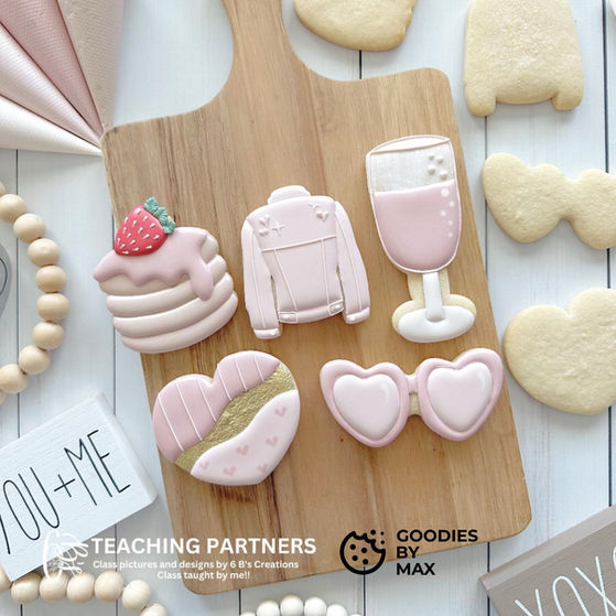 Pink Valentine's cookies: pancake, jacket, wine glass, heart, "YOU+ME" card.