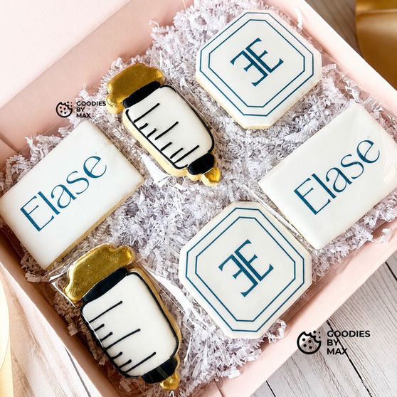 Custom logo cookies in rectangle and square shapes with Green and white branding, made for a corporate rebranding launch