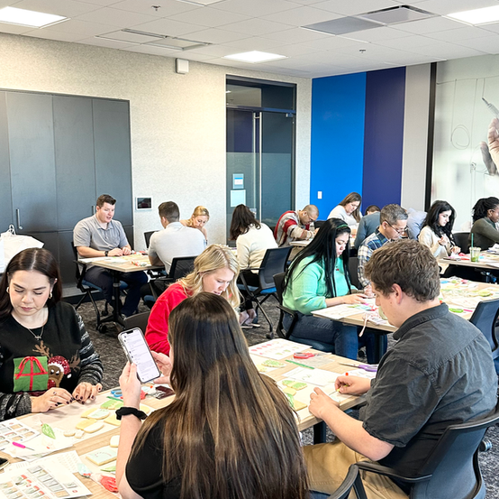 Businesses and companies team building and group outings decorating cookies