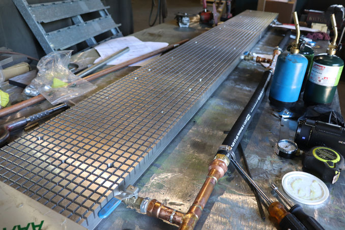 Angled top down view of a non-magnetic workholding solution.