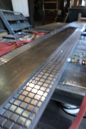 Vacuum workholding solution holding non-magnetic material.