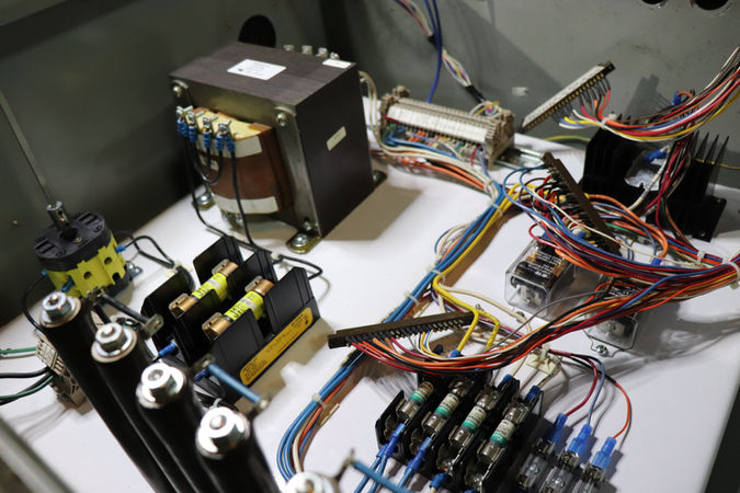 Close up inside view of chuck control terminal box.