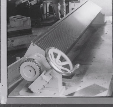 Side view of the HB Series electromagnetic chuck showing the handwheel attached.