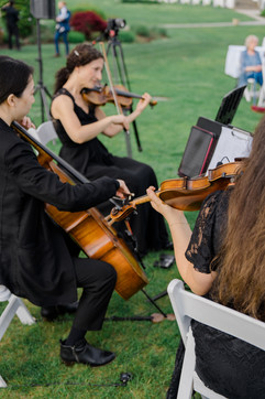 classical wedding musicians performing as a string trio at waters edge resort and spa Westbrook ct wedding ceremony