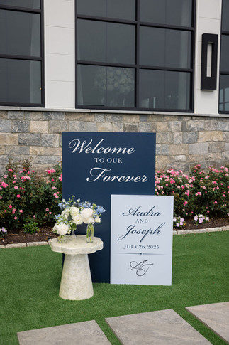 welcome signs at Tyde at Walnut Beach wedding ceremony