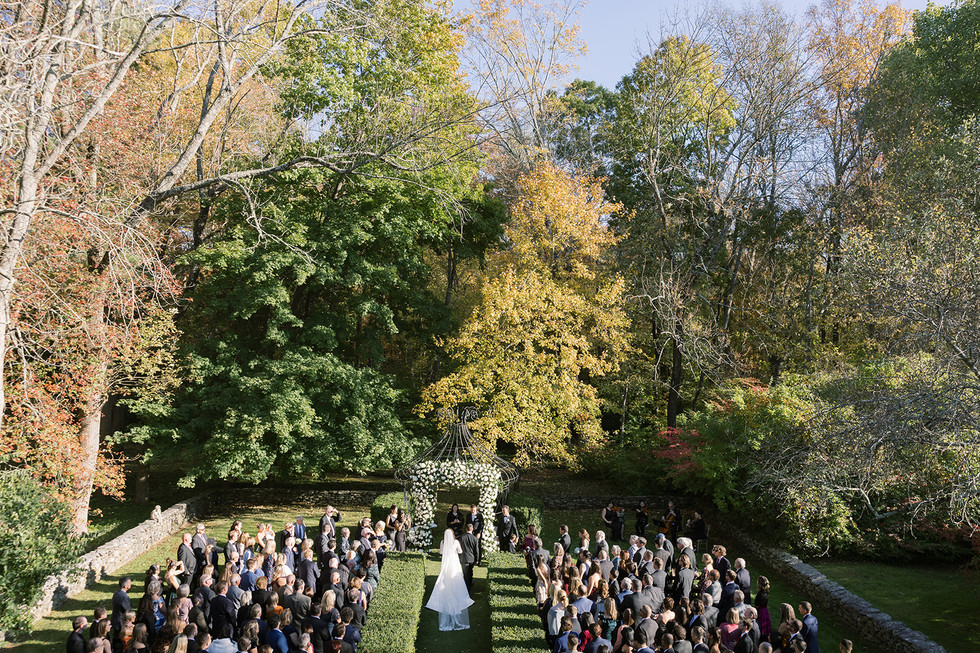 bride walking down the aisle to string quartet at Lord Thompson manor wedding