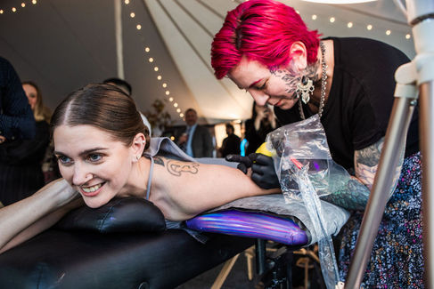 tattoo artist at Priam vineyard wedding