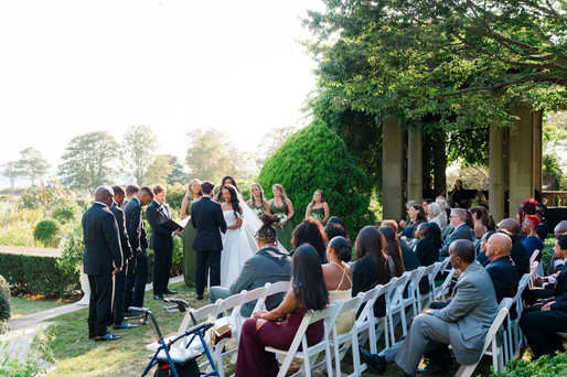 Outdoor wedding ceremony at Eolia Mansion pergola in Harkness Memorial State Park