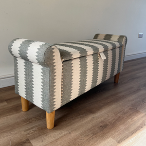 A beautiful striped ottoman