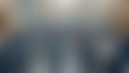 Diverse group of professionals networking and shaking hands at modern conference with digital connectivity overlay