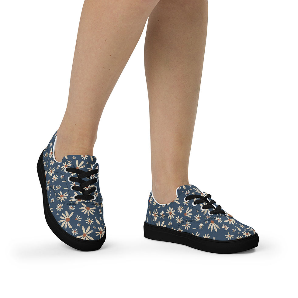 Thumbnail: Model wearing women’s lace‑up canvas shoes in the “Tranquility” print with black sole, side front view.