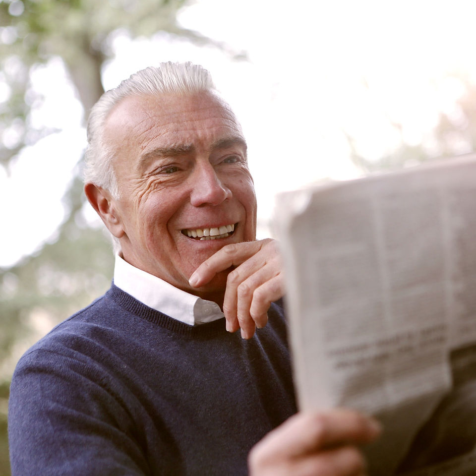 man%20reading%20newspaper_edited.jpg