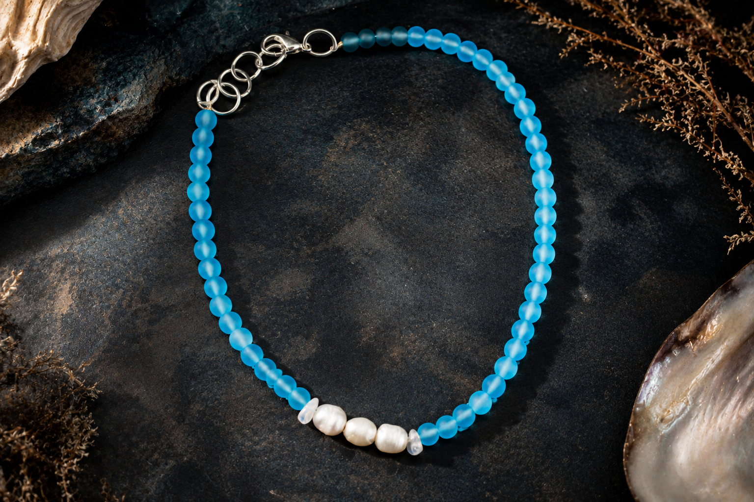 The Crystal Tide blue frosted glass bead necklace with freshwater pearls