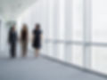 Businesswomen Walking in Hallway