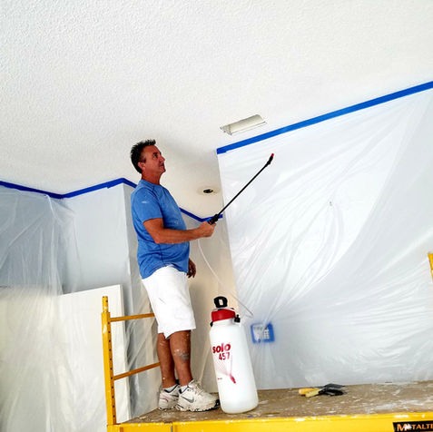 3- spraying water on ceiling.jpg