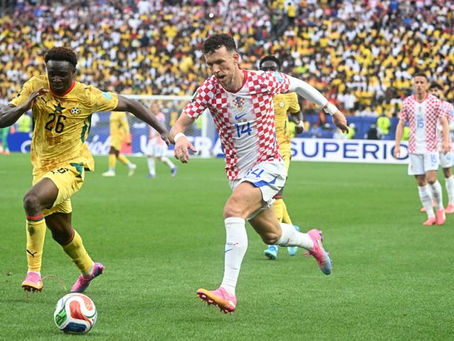 Croatia is victorious in Group L, finally against Ghana, as both teams advance to the Round of 32