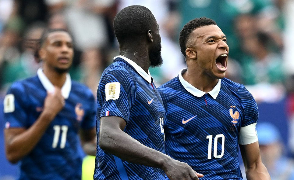 Weather delay and all, France advances to the next round of the World Cup, defeating Iraq