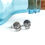 Thumbnail: Silver flat skull stud earrings