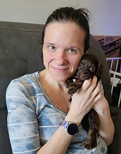 holding goldendoodle puppy