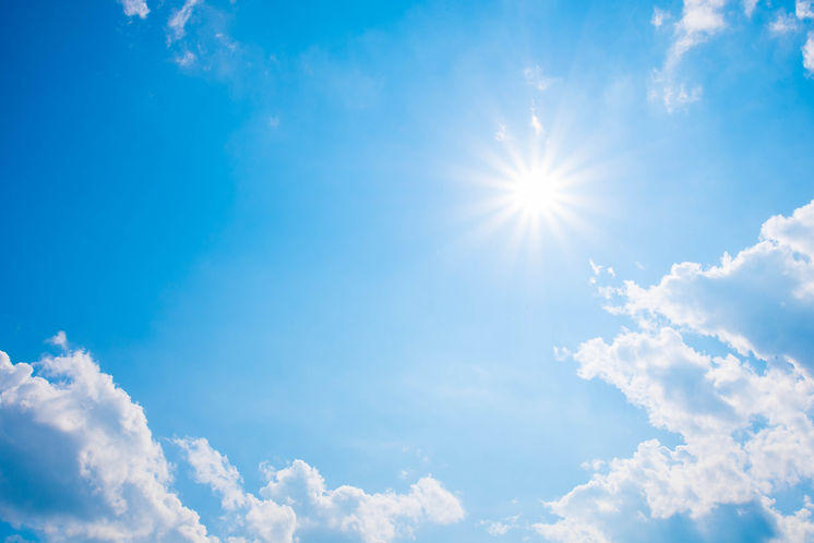 Beautiful shining sun at clear blue sky