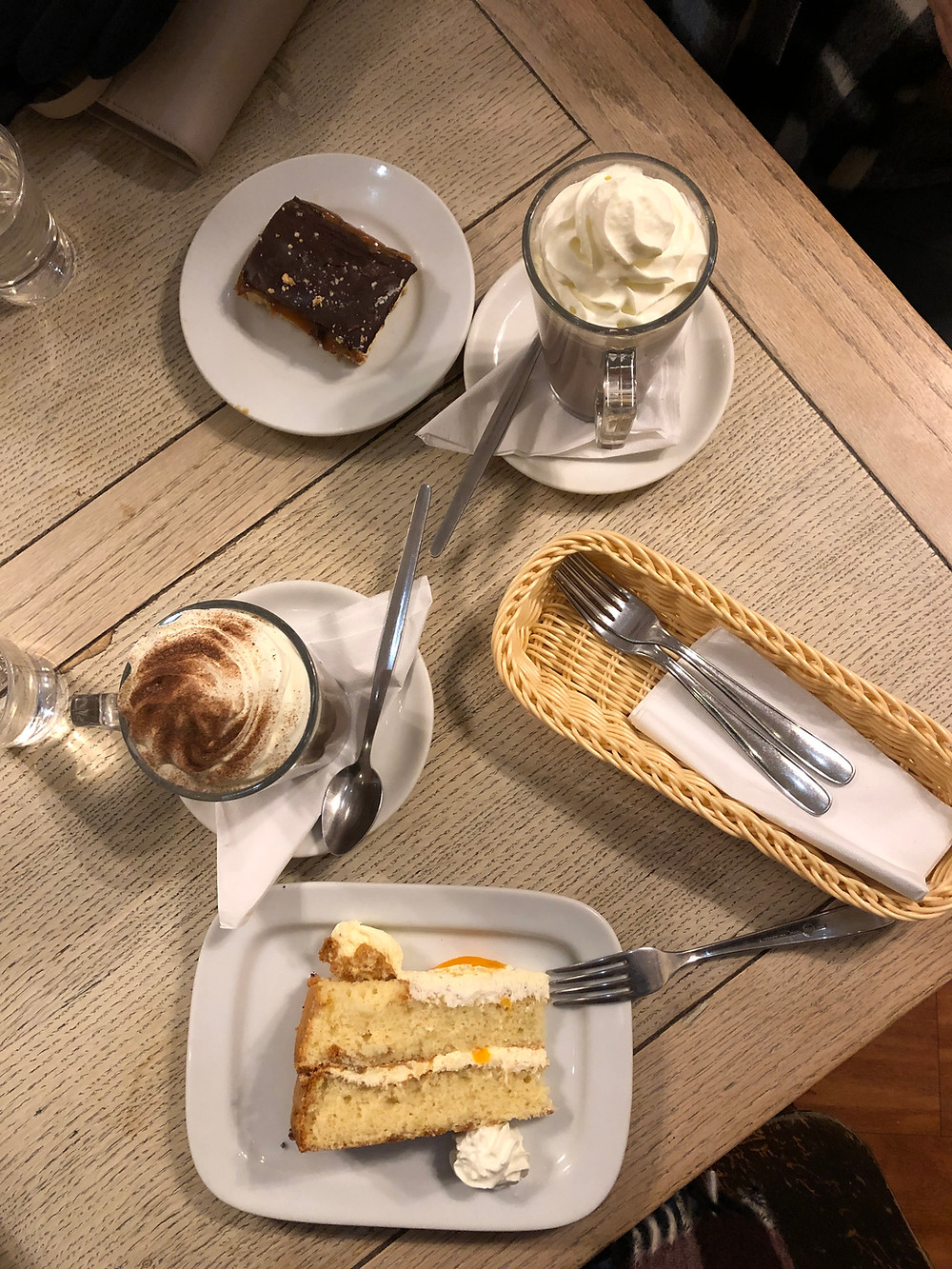 Millionaire shortbread, cake, and espressos in a cafe