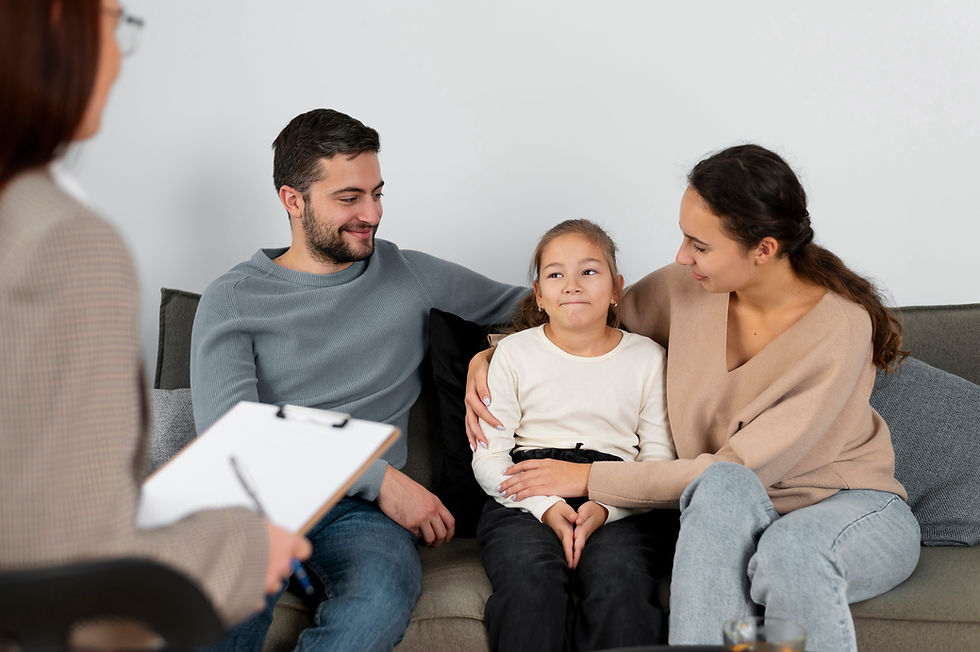 close-up-girl-therapy-session-with-parents (1).jpg