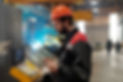 side-view-of-young-engineer-in-workwear-using-digi-2022-03-09-22-19-59-utc.jpg