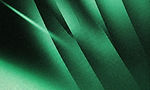 Abstract overlapping green paper layers with light shadows