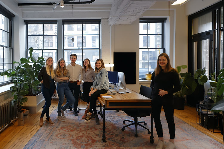 gge8._a_young_marketing_team_in_a_morning-lighted_office_fbef2ecc-956f-43bd-972d-2095f9bd8