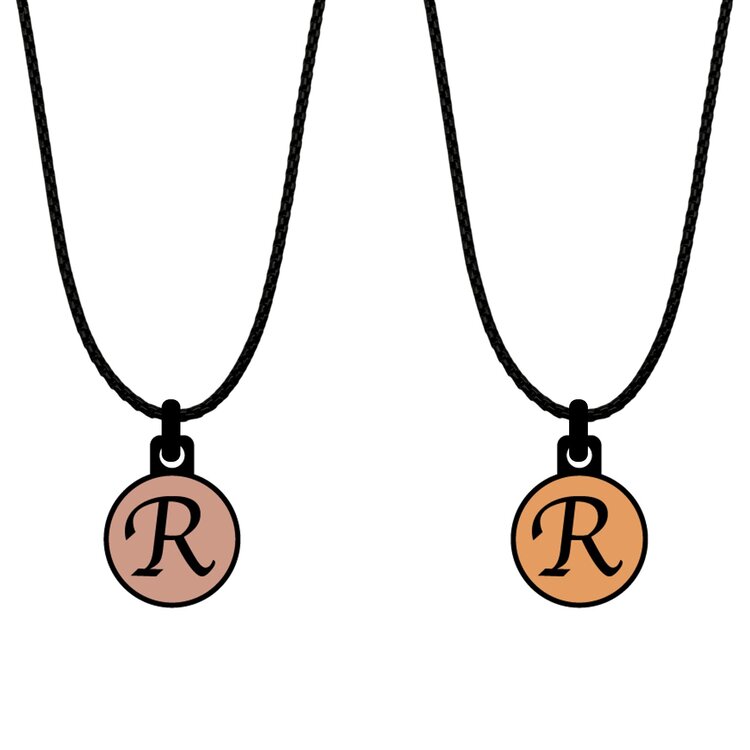 A double-sided 14mm round stainless steel pendant featuring the Initial R rose gold and gold design in a metallic finish. The artwork is visible on both sides, giving the pendant a distinctive look from every angle. by Urband London