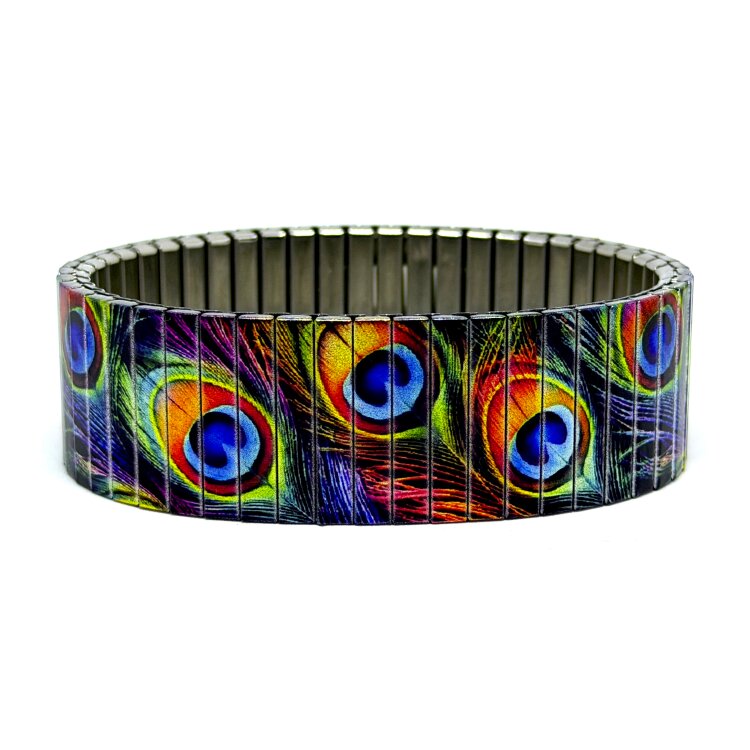 A bold 22mm stainless steel stretch bracelet featuring the Peacock Colourful feathers design in a metallic finish. The wide profile gives the artwork maximum impact, while the clasp-free construction makes it easy and comfortable to wear. by Urband London
