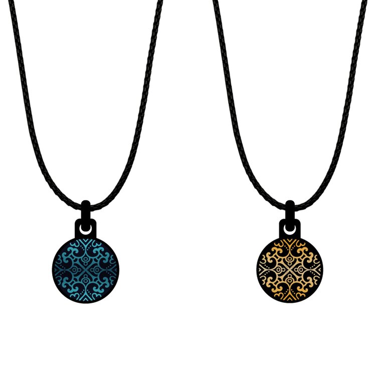 A double-sided 14mm round stainless steel pendant featuring the Mandala Daisies granda design in a metallic finish. The artwork is visible on both sides, giving the pendant a distinctive look from every angle.  by Urband London