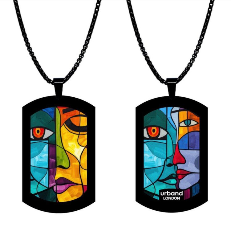 A double-sided 24mm x 40mm stainless steel pendant featuring the Art cubism design in a metallic finish. The artwork is visible on both sides, giving the pendant a distinctive look from every angle. Waterproof, scratch-resistant and nickel-free, it is handmade in London and presented in a gift box. by Urband London