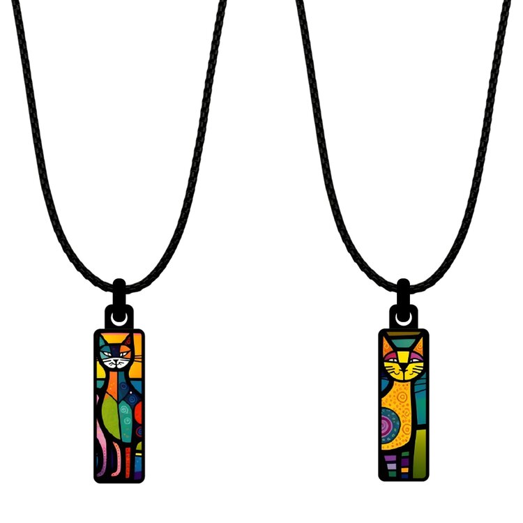 A double-sided 8mm x 24mm rectangular stainless steel pendant featuring the Art cats paradise design in a metallic finish. Its slim shape and two-sided artwork give it a contemporary, easy-to-wear character. by Urband London