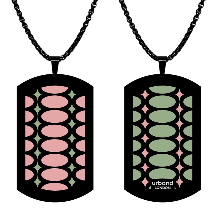 A double-sided 29mm x 50mm stainless steel pendant featuring the Ovals Stretched rose design in a metallic finish. The larger format gives the two-sided artwork strong visual impact from every angle. Waterproof, scratch-resistant and nickel-free, it is handmade in London and presented in a gift box. by Urband London