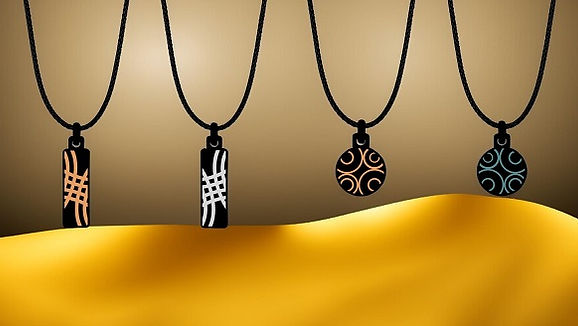 Handmade double-sided stainless steel designer small pendants made in London. The Circles Within collection