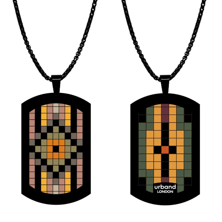 A double-sided 24mm x 40mm stainless steel pendant featuring the Soho cross pixels design in a metallic finish. The artwork is visible on both sides, giving the pendant a distinctive look from every angle.  by Urband London