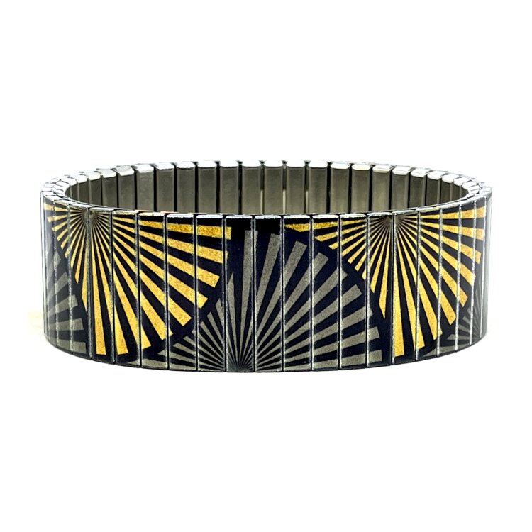 A bold 22mm stainless steel stretch bracelet featuring the Circles Eclipse Japanese sensu design in a metallic finish. The wide profile gives the artwork maximum impact, while the clasp-free construction makes it easy and comfortable to wear. by Urband London