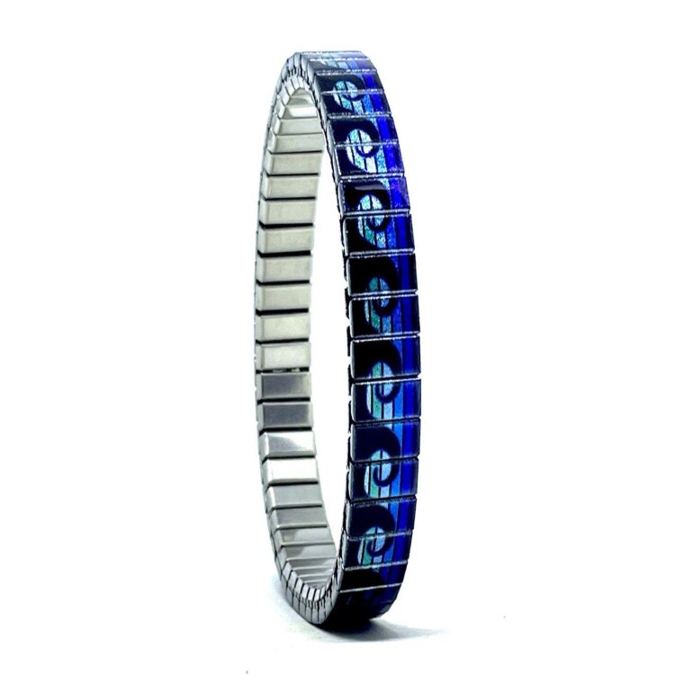 6mm stainless steel stretch bracelet featuring the Waves Lines blue sunset artwork in a metallic finish. Clasp-free, waterproof, scratch-resistant and nickel-free. Handmade in London and supplied in a gift box. by Urband London