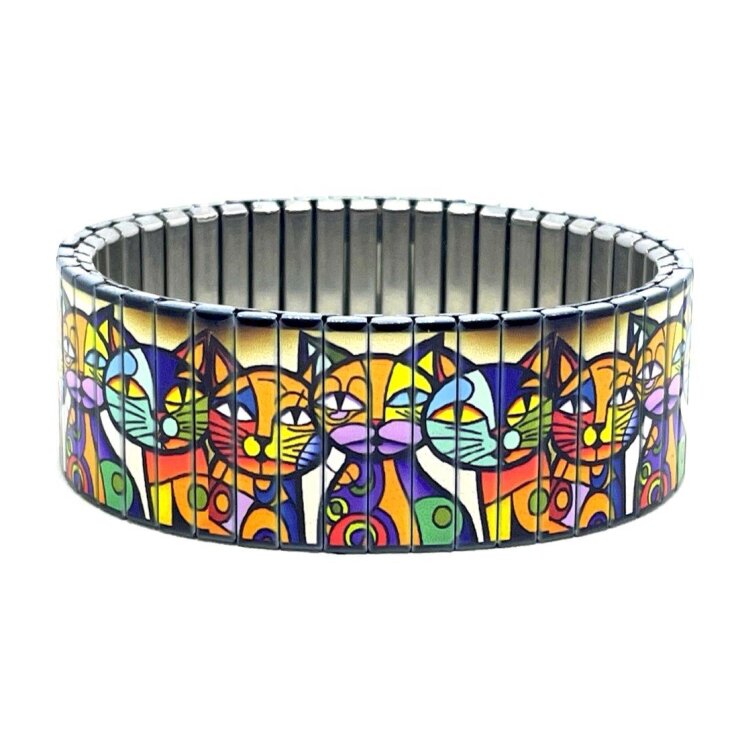 A bold 22mm stainless steel stretch bracelet featuring the Art cats family design in a polished finish. The wide profile gives the artwork maximum impact, while the clasp-free construction makes it easy and comfortable to wear. Waterproof, scratch-resistant and nickel-free, each bracelet is handmade in London and presented in a gift box. by Urband London