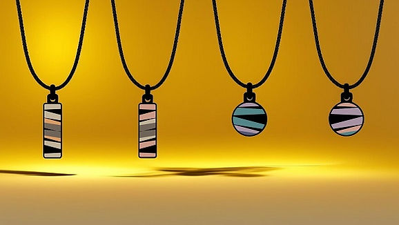 Handmade double-sided stainless steel designer small pendants made in London. The Lines Art collection