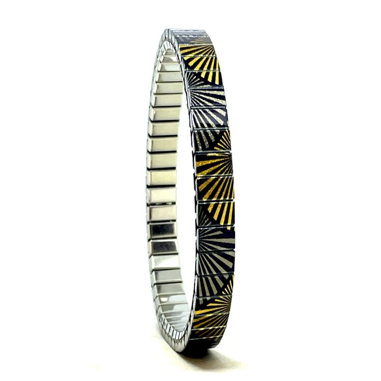 A slim 6mm stainless steel stretch bracelet featuring the Circles Eclipse Japanese sensu design in a metallic finish. The clasp-free construction slips easily over the wrist for comfortable everyday wear.  by Urband London