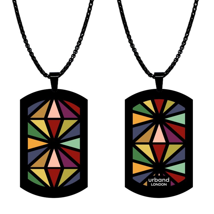 A double-sided 24mm x 40mm stainless steel pendant featuring the Triangles red kaleidoscope design in a metallic finish. The artwork is visible on both sides, giving the pendant a distinctive look from every angle. by Urband London