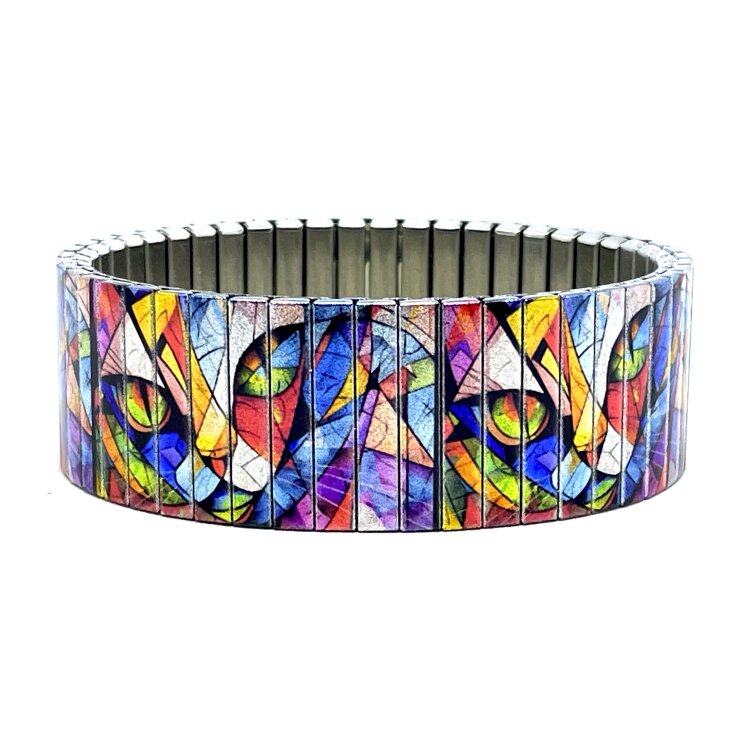 A bold 22mm stainless steel stretch bracelet featuring the Art cat face cubism style design in a metallic finish. The wide profile gives the artwork maximum impact, while the clasp-free construction makes it easy and comfortable to wear. Waterproof, scratch-resistant and nickel-free, each bracelet is handmade in London and presented in a gift box. by Urband London