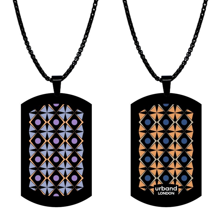 A double-sided 24mm x 40mm stainless steel pendant featuring the Stars Triangled golden blue design in a metallic finish. The artwork is visible on both sides, giving the pendant a distinctive look from every angle. Waterproof, scratch-resistant and nickel-free, it is handmade in London and presented in a gift box. by Urband London