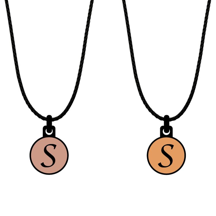 A double-sided 14mm round stainless steel pendant featuring the Initial S rose gold and gold design in a metallic finish. The artwork is visible on both sides, giving the pendant a distinctive look from every angle.  by Urband London